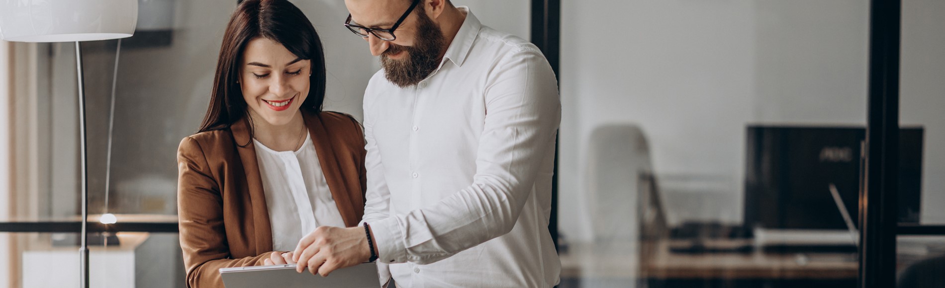 Two Business Partners Working In Office