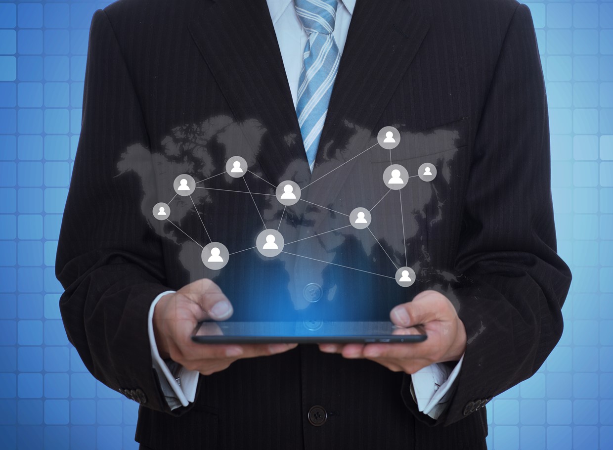 Businessman Holding Tablet With Virtual Application